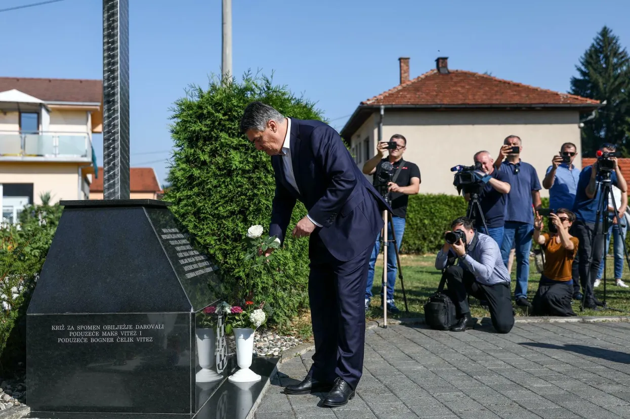 12.07.2021., Vitez, Bosna i Hercegovina - Predsjednik Republike Hrvatske Zoran Milanovic odao je pocast polaganjem bijele ruze i paljenjem svijece na spomen obiljezje "Osmica" u spomen na osmero poginule djece.
Photo: Armin Durgut/PIXSELL