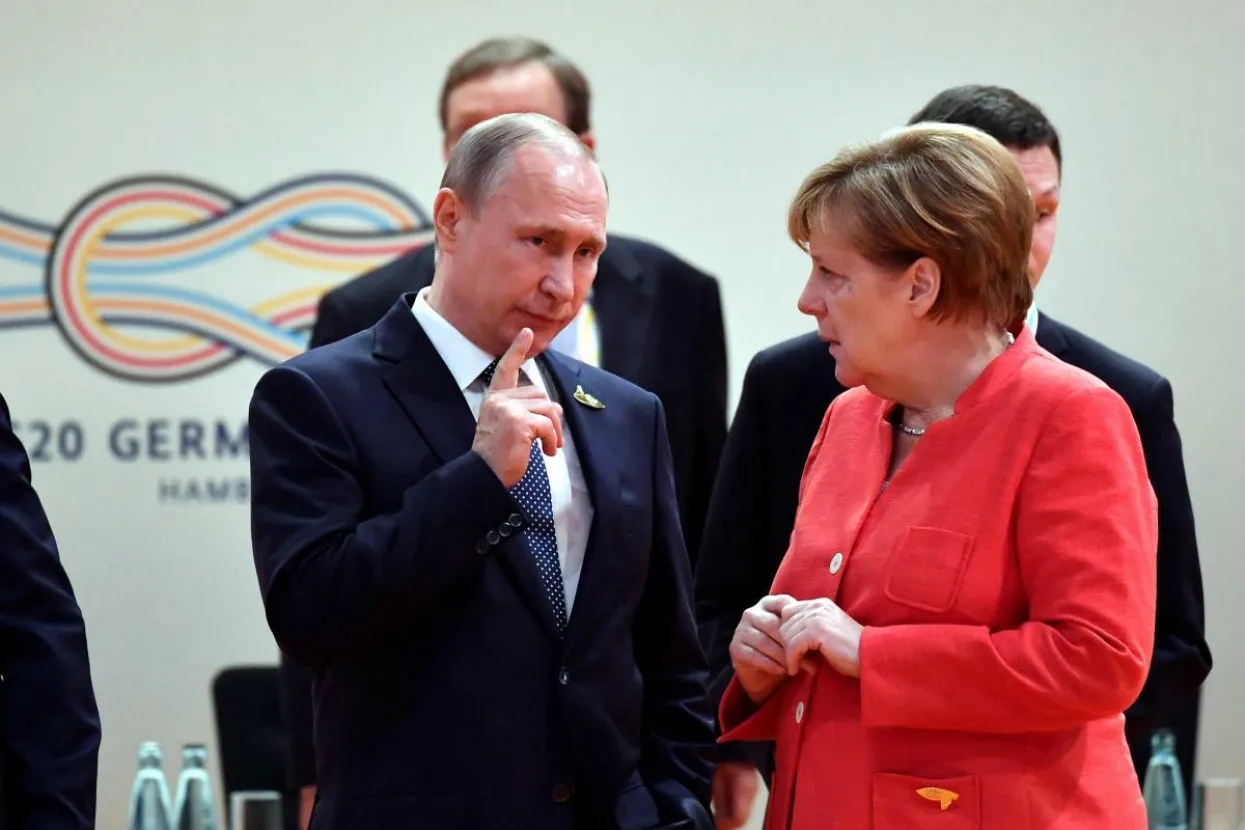 Vladimir Putin i Angela Merkel