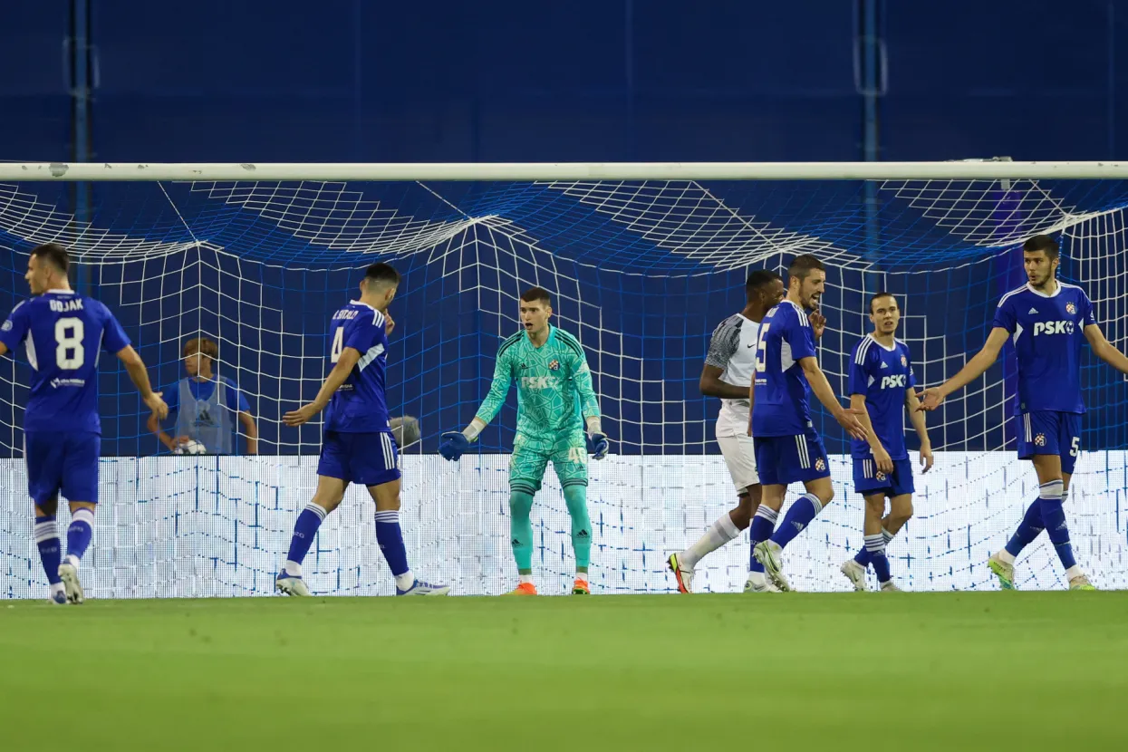 Zabreb, 09.08.2022 - Uzvratna utakmica 3. pretkola Lige prvaka između GNK Dinama i PFC Ludogoretsa na stadionu u Maksimiru. Na slici Amer Gojak, Bo&scaron;ko &Scaron;utalo, Dominik Livaković, Arijan Ademi.