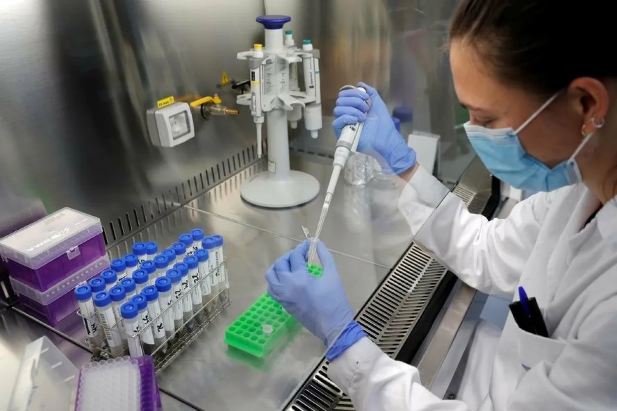 epa08539087 A worker of Global Omnium Labs uses a Gamaser technique to analyze wastewaters in the search of coronavirus genomic residue, in Valencia, Spain, 10 July 2020. Countries around the world are taking increased measures to stem the widespread of the SARS-CoV-2 coronavirus which causes the COVID-19 disease. EPA-EFE/KAI FOERSTERLING